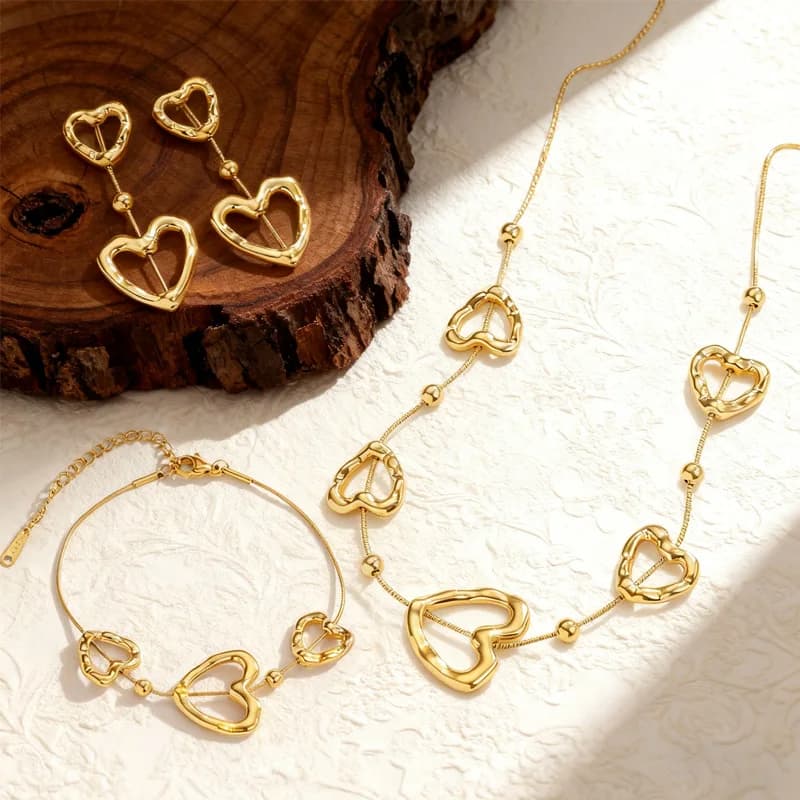 Nextvance Orecchini a forma di cuore irregolare, bracciale, collana per donna, set di gioielli in acciaio inossidabile placcato oro, regali