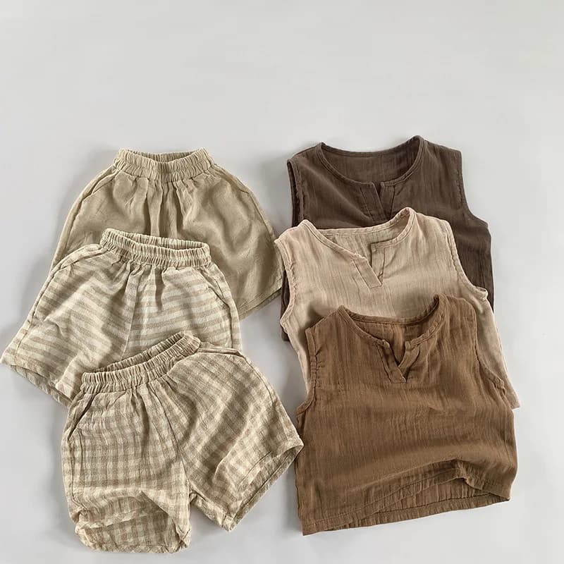 Abbigliamento per bambini in stile coreano 2025 Pantaloncini larghi per neonati estivi Pantaloni per bambini a righe scozzesi