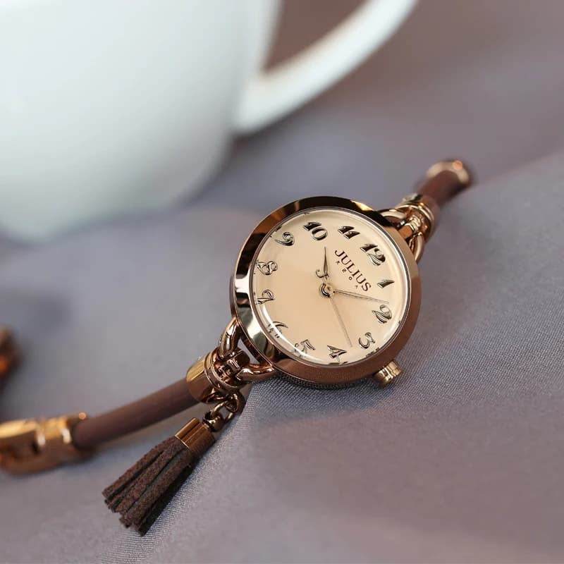 Korean style women's watch with thin strap, delicate tassel leather strap, retro style. A timepiece and accessory for women.