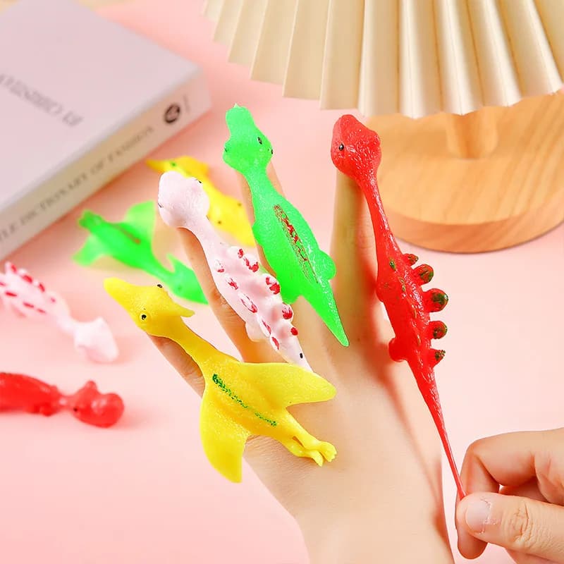 Dito Catapulta Dinosauro Turchia Romanzo e divertimento Scherzo Giocattolo di gomma morbida Scuola materna Gioco per bambini Giocattoli Giocattoli di decompressione per adulti