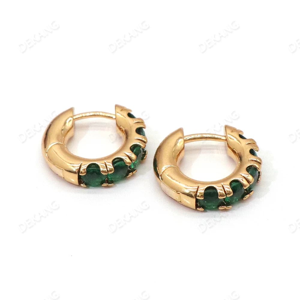 Small round emerald earrings are light and stylish luxury earrings