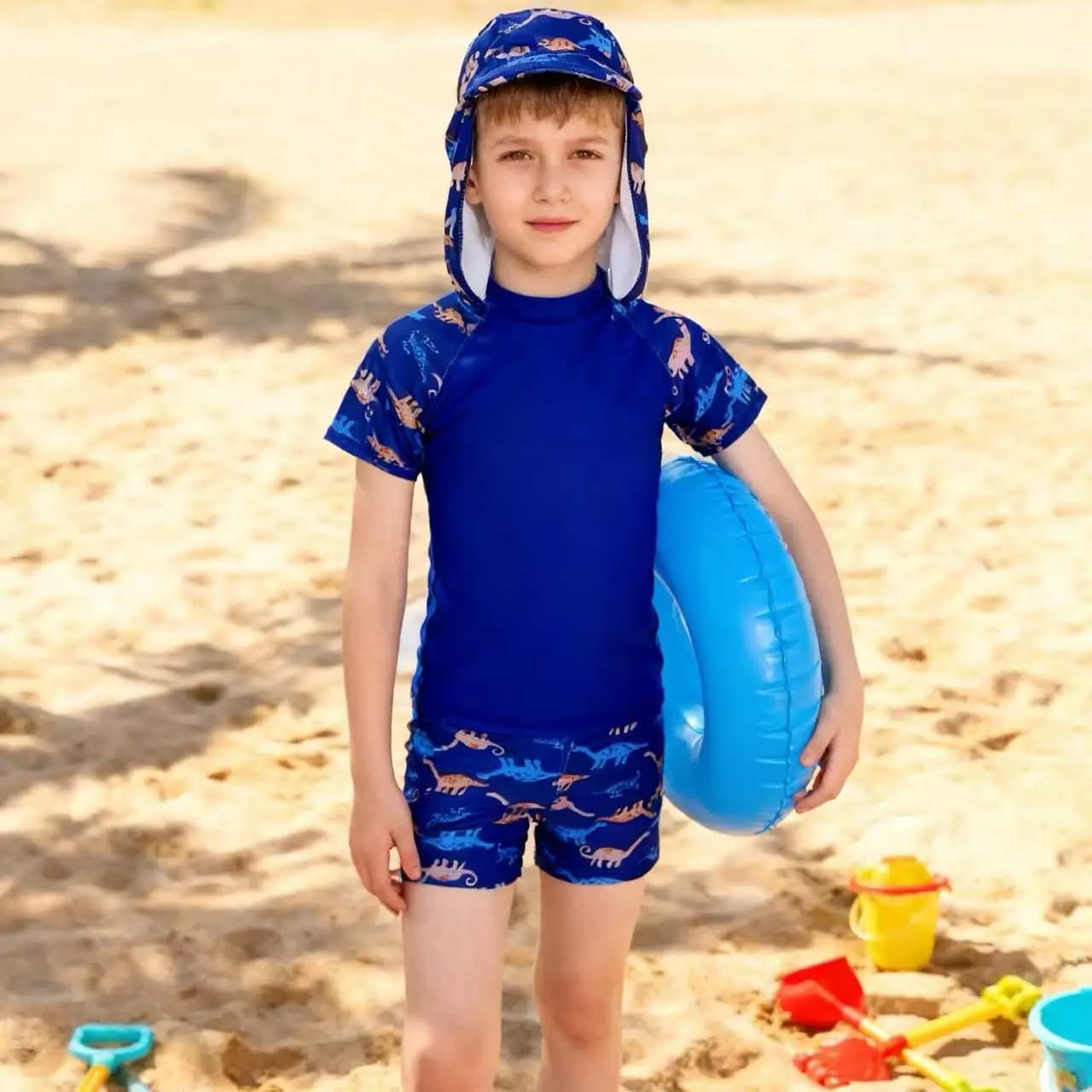 Two-piece swimsuit for kids with dinosaur print, surf and beach clothing, UV protection, swimming hood, water suit for boys with sleeves