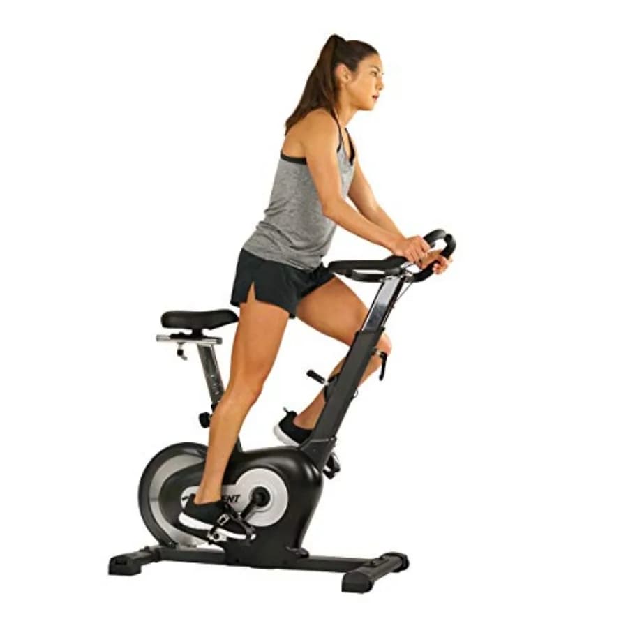 Cyclette da interno magnetica con trazione posteriore con monitor LCD, peso massimo 242 libbre e supporto per tablet