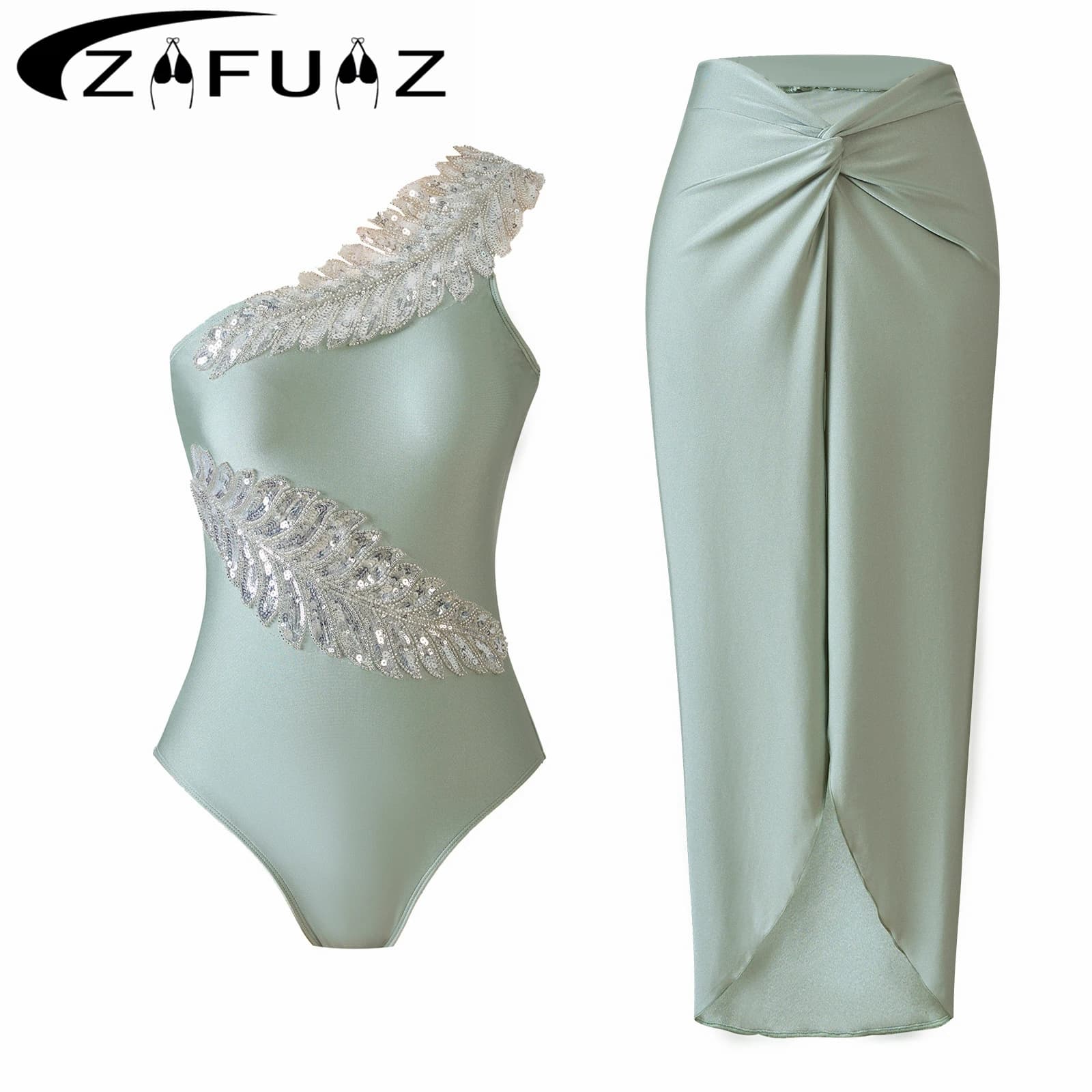 Costume da bagno intero con ricamo a foglia con paillettes monospalla 2026 Costume da bagno intero con foglie sexy tinta unita Costume da bagno femminile in due pezzi