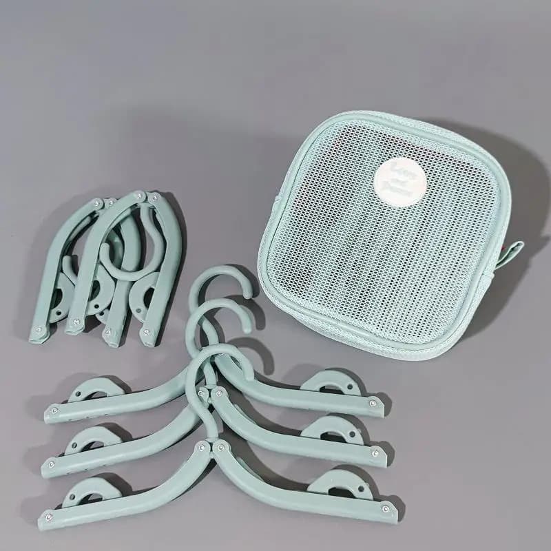 [19 grucce pieghevoli antiscivolo con 12 clip stendibiancheria da viaggio 6 grucce set portatile borsa portaoggetti in rete per lavanderia