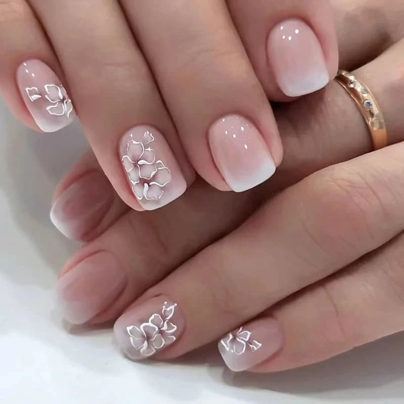 24 short french nails with simple shaded flowers with 1 gelatinous glue and 1 nail file