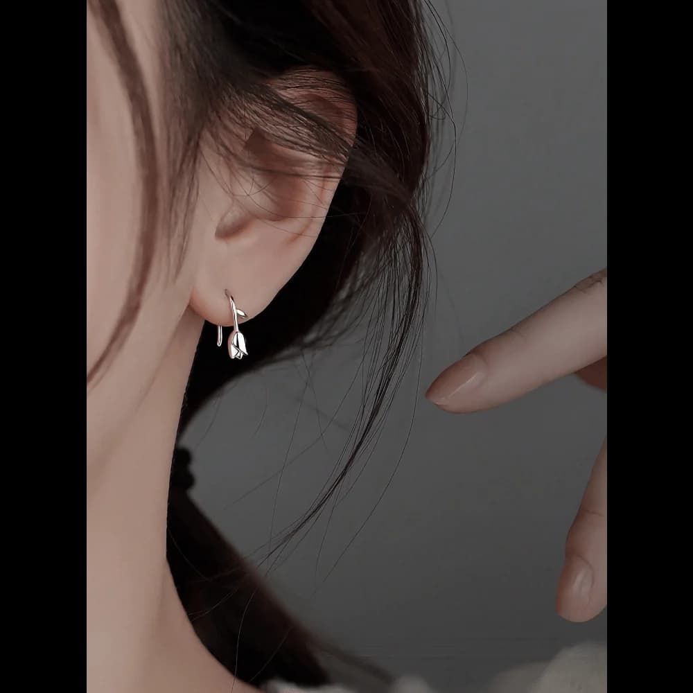 A pair of cute little tulip earrings—an elegant holiday gift for a girl
