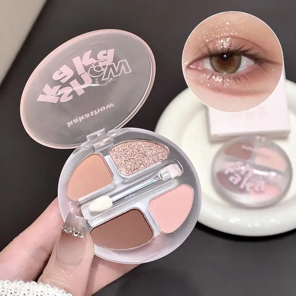 Palettes of glossy opaque eye shadows from 4 colors Palettes of long lasting waterproof shadows with pink glitter pigment naked with brush