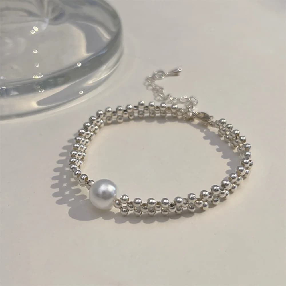 Bracciale intrecciato cavo semplice Bracciale di perle di lusso leggero Accessori di gioielli versatili alla moda per regalo da donna
