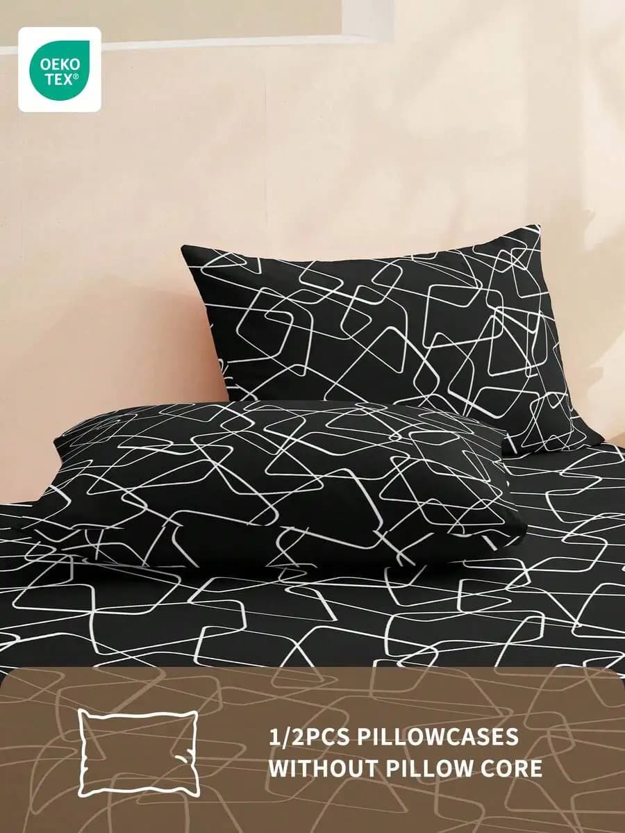 2 black cushion covers with geometric print, OEKO-TEX certified, envelope closure, soft and breathable fabric