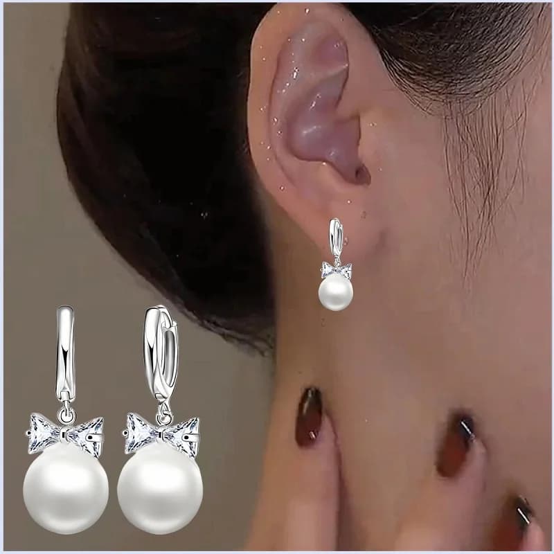 Elegante set di orecchini pendenti con collana di zirconi cubici con perle bowknot in argento sterling 925 per regali di gioielli per feste di nozze da donna
