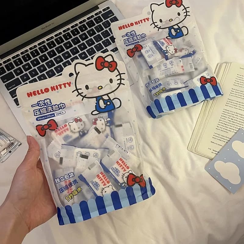 Nuova vendita calda Asciugamano compresso usa e getta Hello Kitty Asciugamano per il viso portatile indipendente in confezione piccola per le gite di viaggio