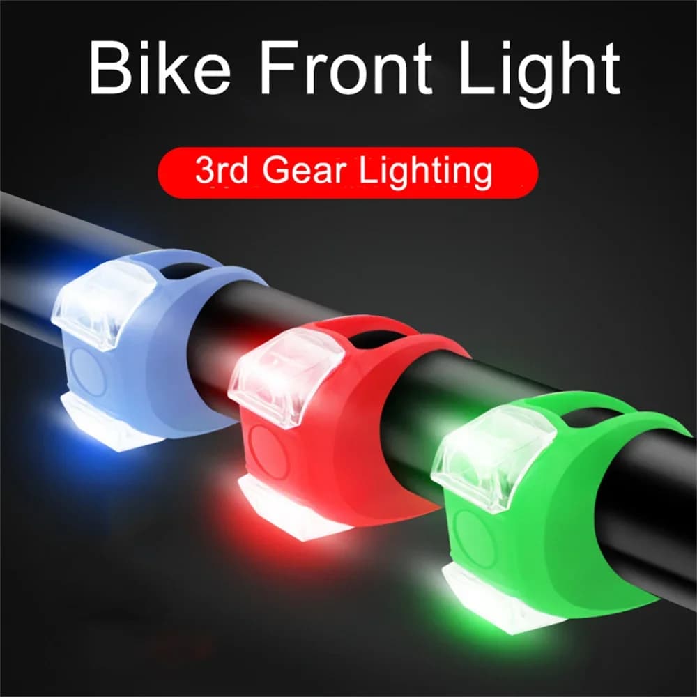 Luce anteriore per bici LED in silicone Ruota anteriore posteriore Luce per bicicletta Flash Spia di sicurezza Lampada posteriore impermeabile Accessori per biciclette