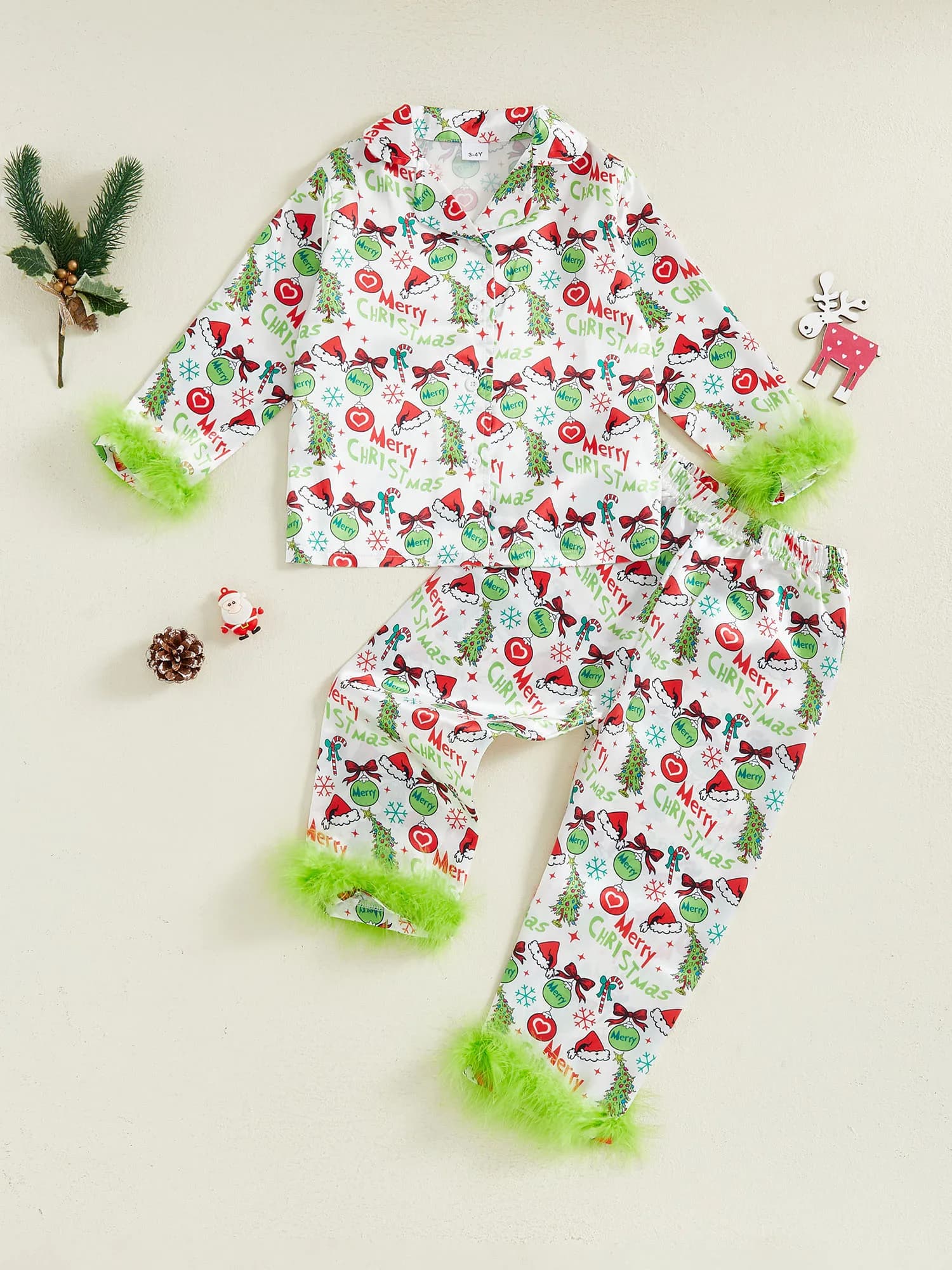 Lovely set pyjamas for girls with festive holiday motifs on comfortable long sleeve tops and matching trousers for an elegant