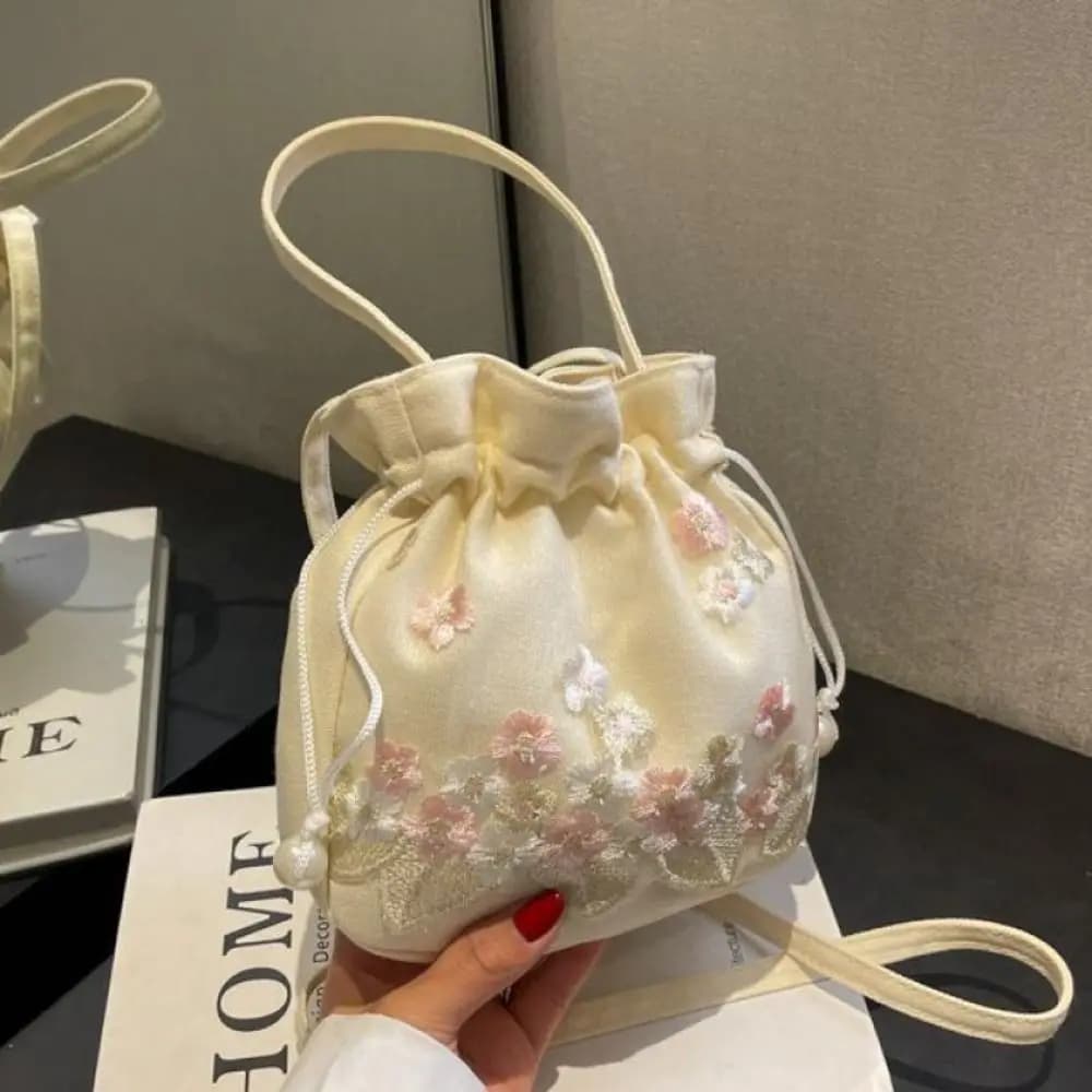 Borsa con coulisse Hanfu in stile etnico Borsa a tracolla cinese Borsa a tracolla con fiori ricamati Borsa a secchiello floreale in stile antico