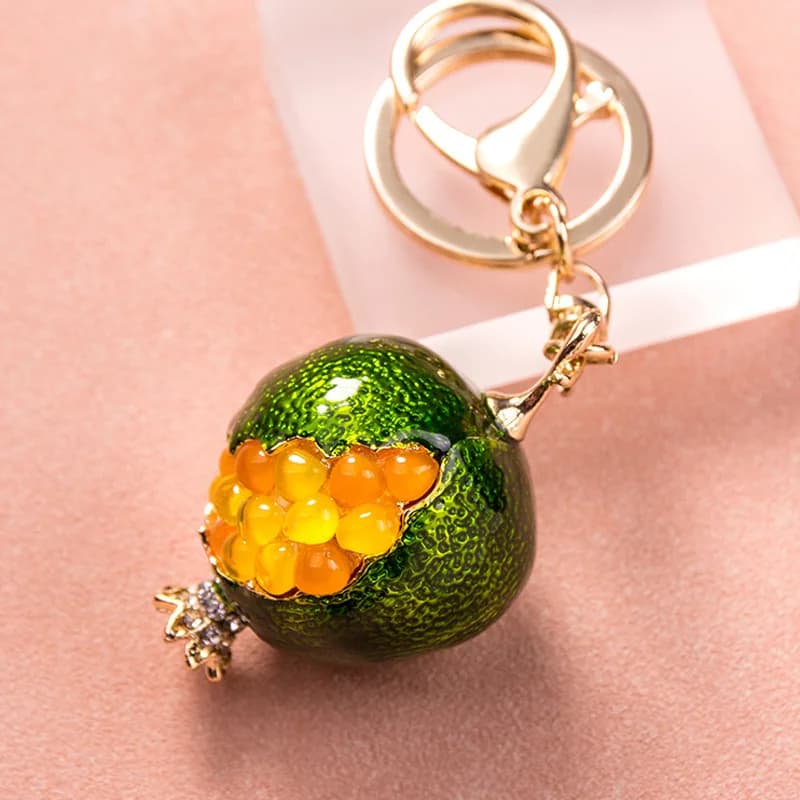 Nuovo creativo cristallo intarsiato melograno portachiavi per auto borsa carina ciondolo portachiavi in metallo regalo per feste all'ingrosso