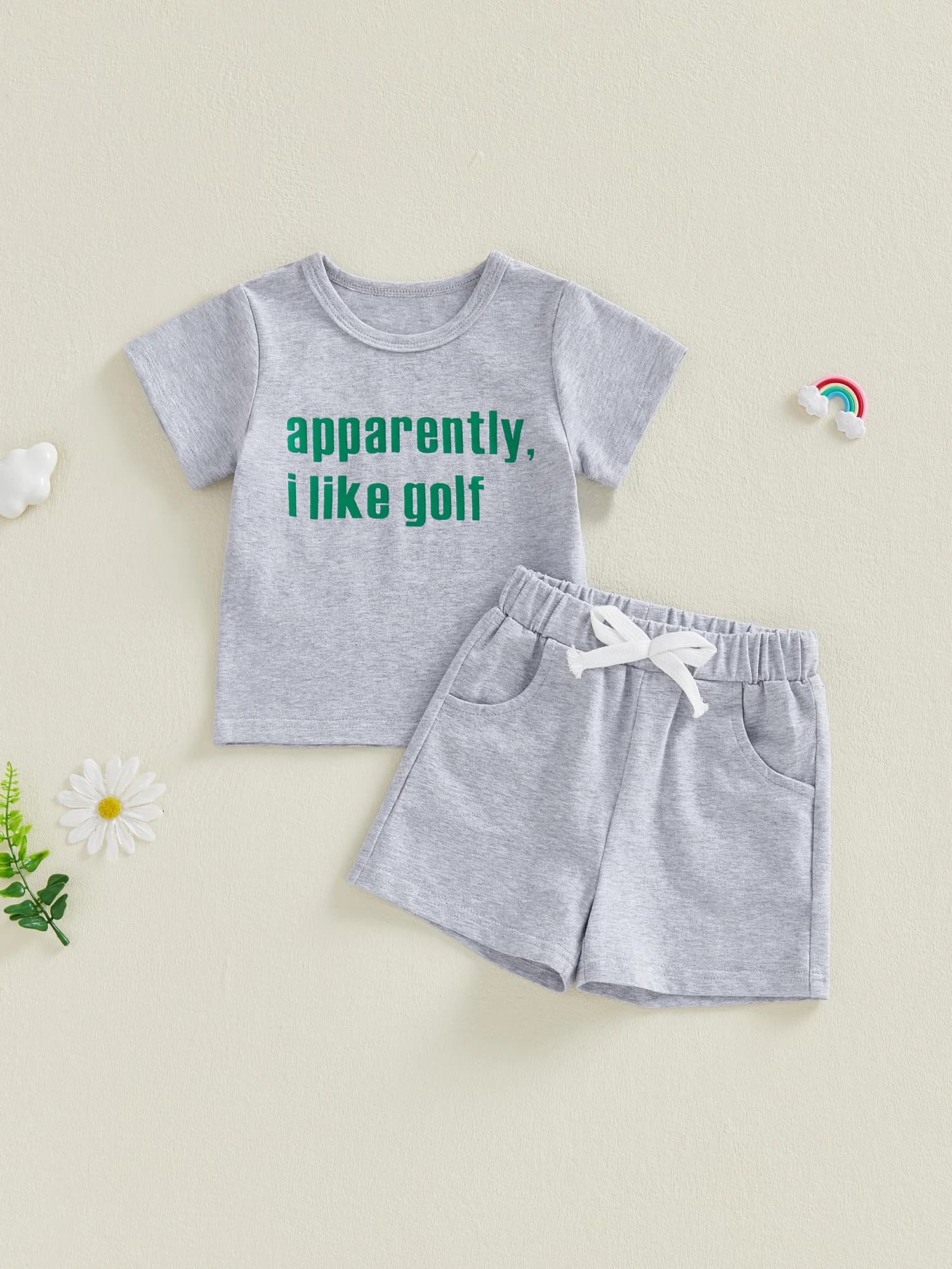 Set of summer clothes for newborns with cute T-shirt with print of letters and solid shorts combined for boys and girls