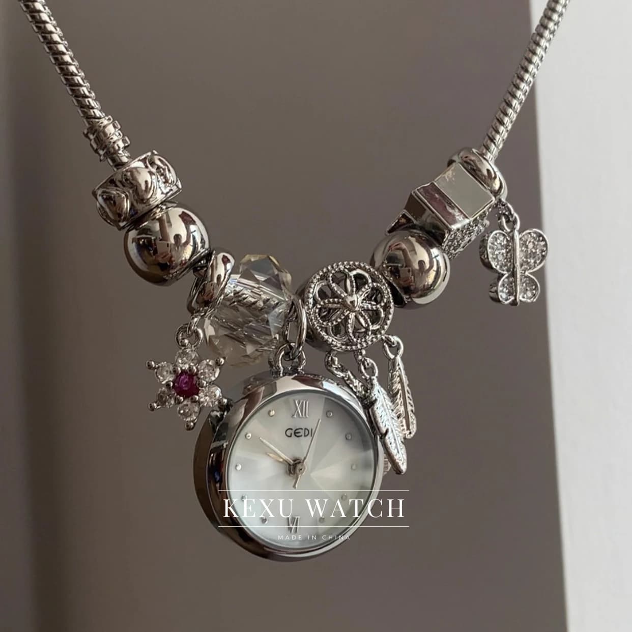 GEDI Watch Handmade White Mother of Pearl Dial Charm Bracelet Watch, Elegant Dreamcatcher Accent Silver Bracelet Ladies Watch