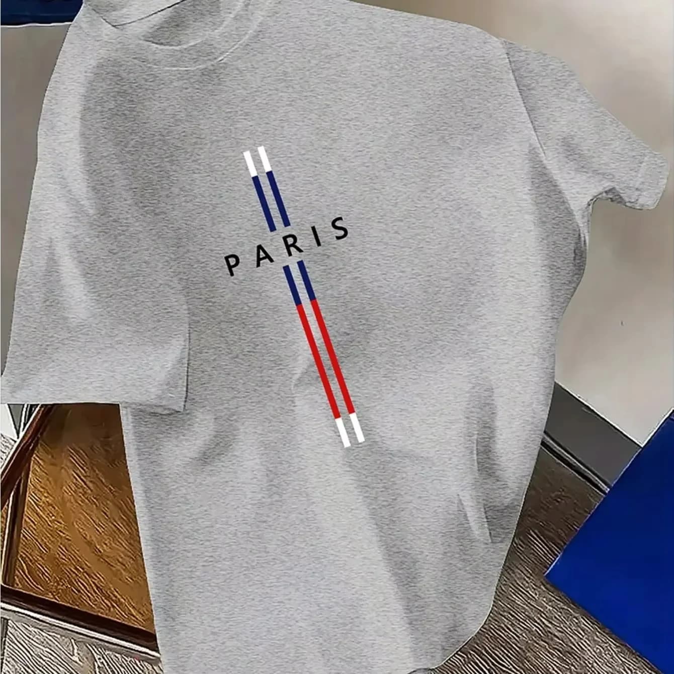 T-shirt alla moda casual, ampia e comoda, con stampa di lettere Paris, girocollo, maniche corte, nuovo articolo da uomo