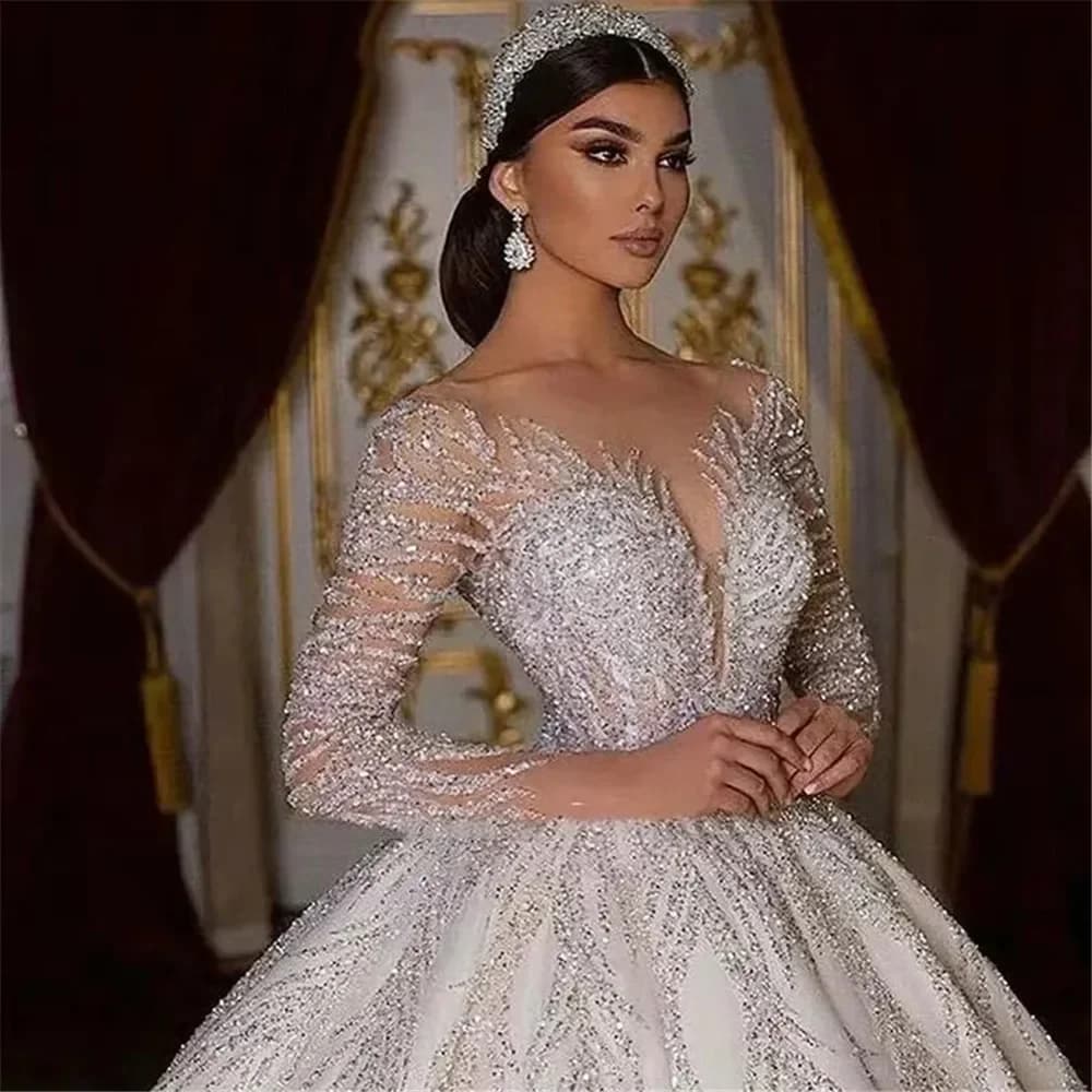 Abiti da sposa principessa di lusso personalizzati Cristalli Abito da sposa con perline Illusion Tulle Maniche lunghe Sparkly Vestido d