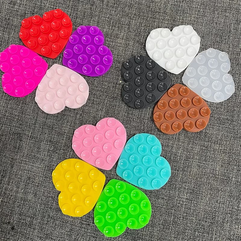 Ventosa in silicone bifacciale a forma di cuore Ventosa antiscivolo Staffa di supporto per telefono Ventosa Adesivo per telefono autoadesivo