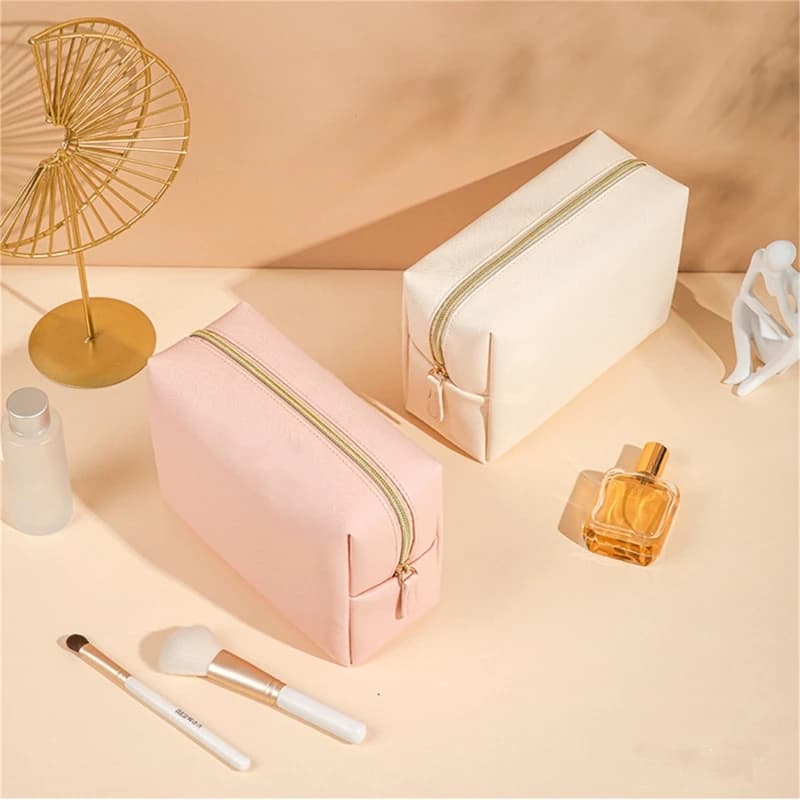 Borsa per cosmetici da donna Borsa per trucco impermeabile in pelle PU tinta unita Borsa da viaggio portatile per riporre articoli da toeletta
