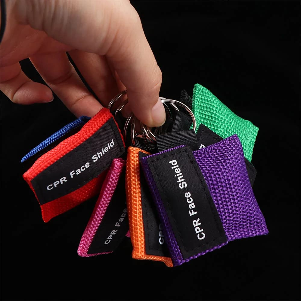 Disposable CPR Mask Mouth Breath Professional Emergency Face Shield Nylon Bag Keychain Ring Resuscitator Mask Travel Pocket