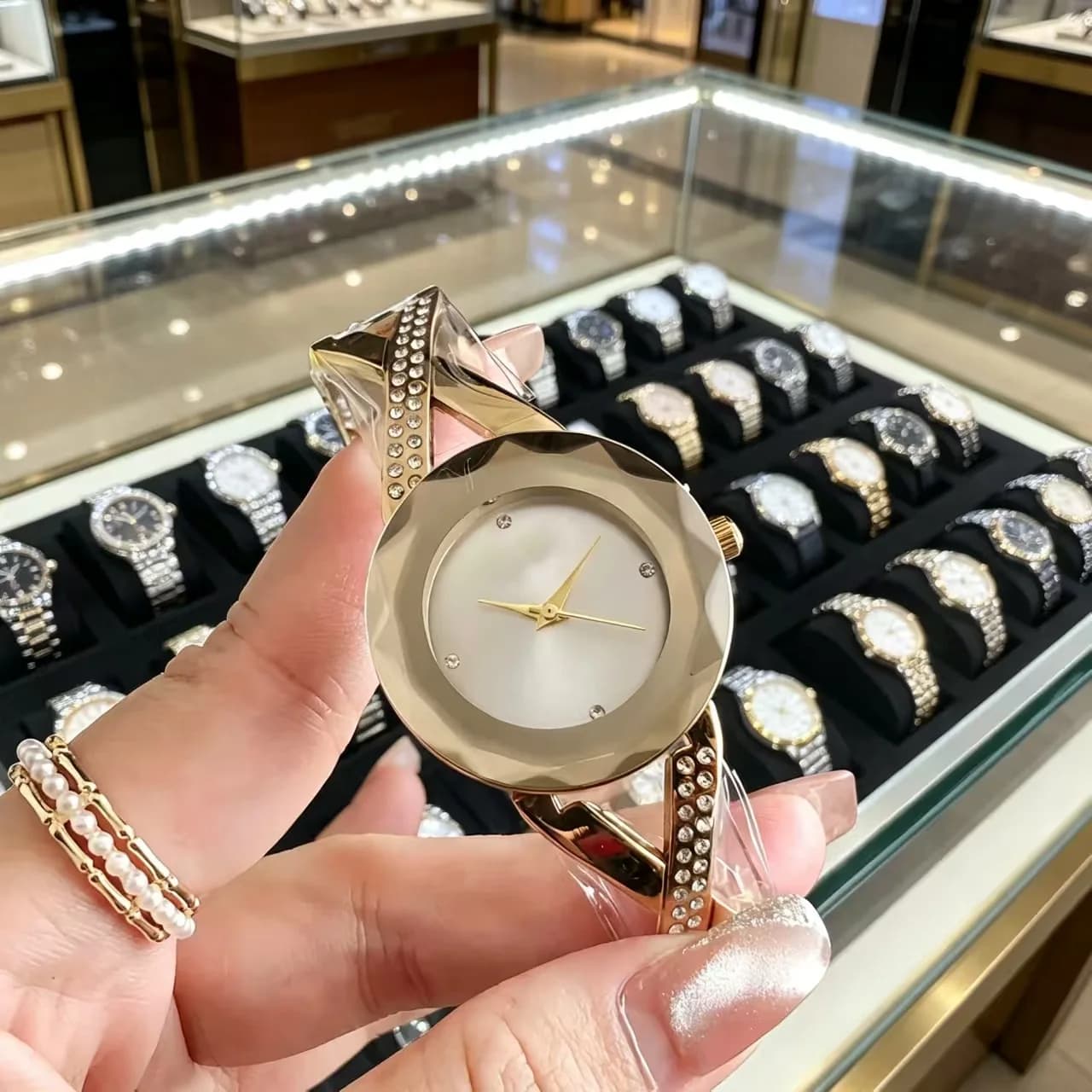 Elegant Gold Tone Women Watch Faceted Crystal Case White Dial Cross Crystal Bangle
