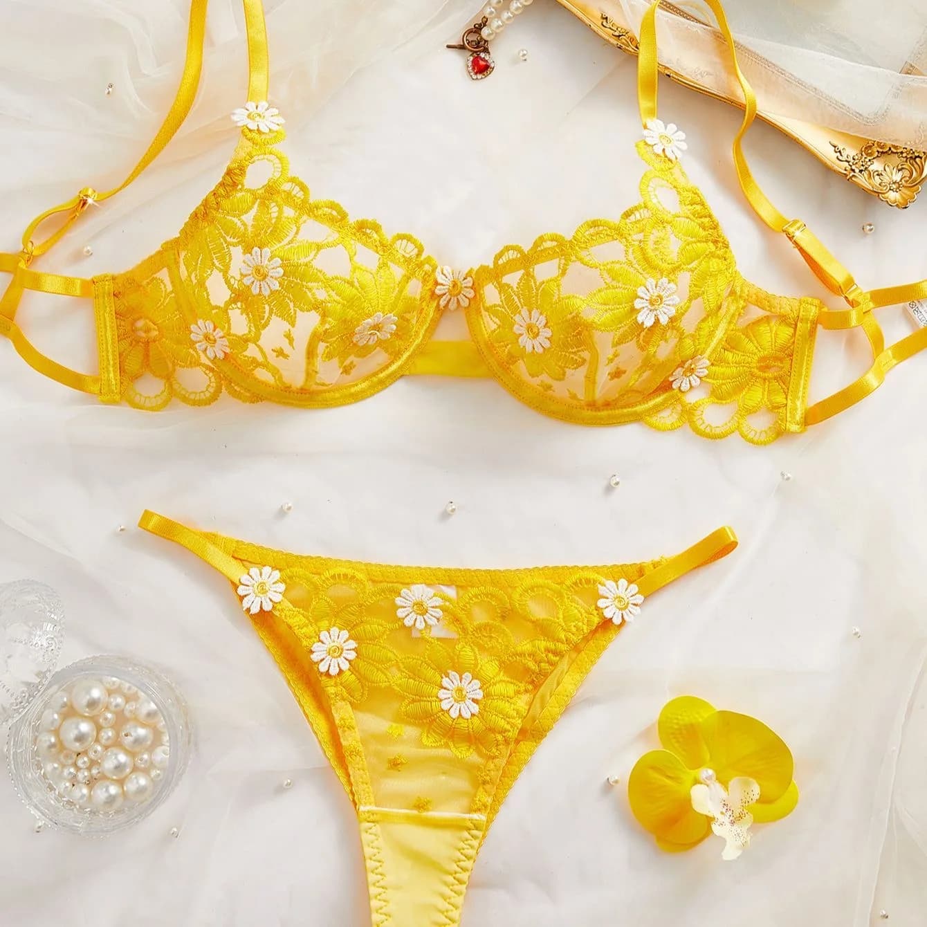 Sexy lingerie for woman, bra and thong in yellow lace with flowers, sexy lingerie very sensual, sexy underwear, adult clothing, erotic outfit.