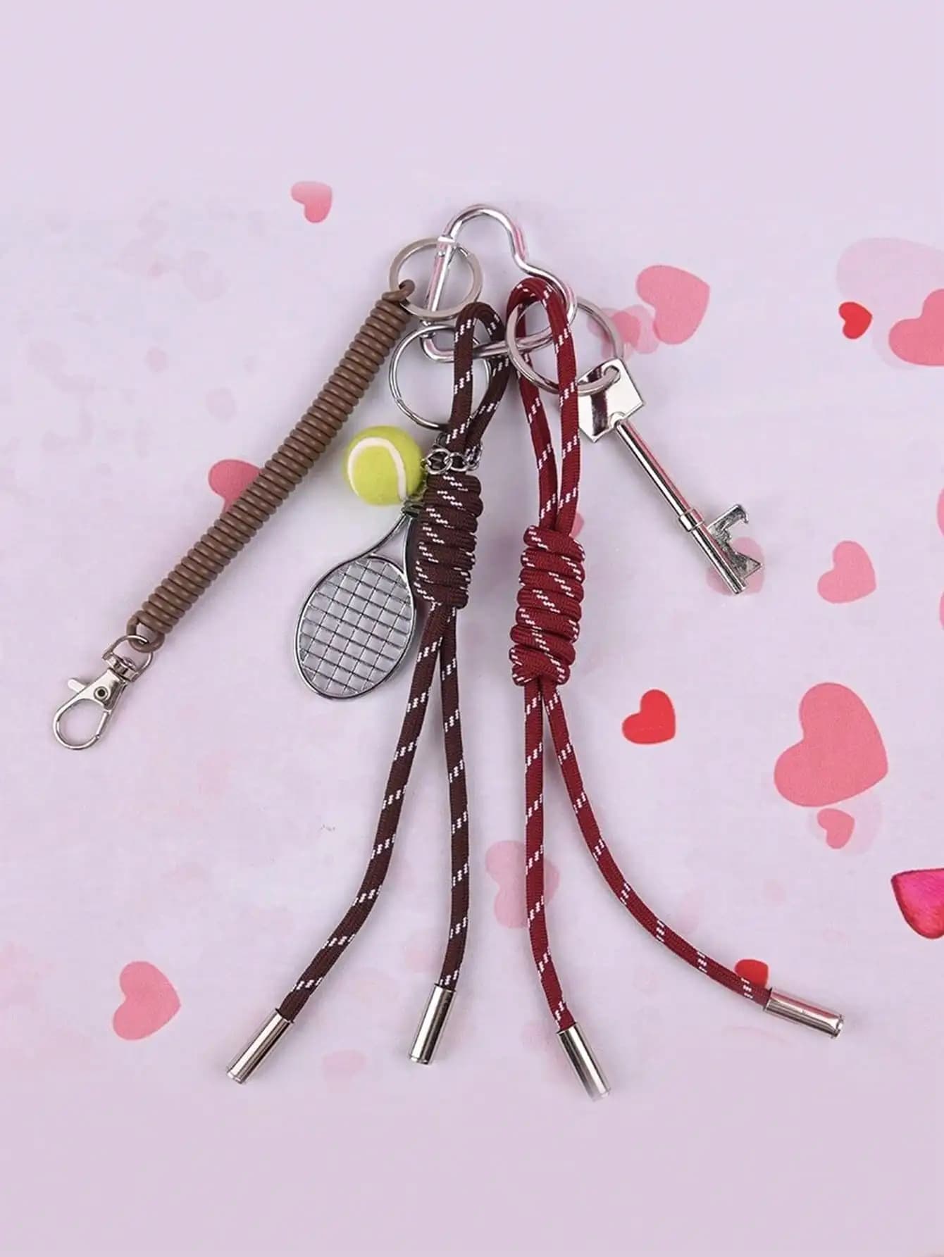 Portachiavi artigianale con pallina da tennis annodata, ciondolo per borsa, zaino o tracolla, idea regalo