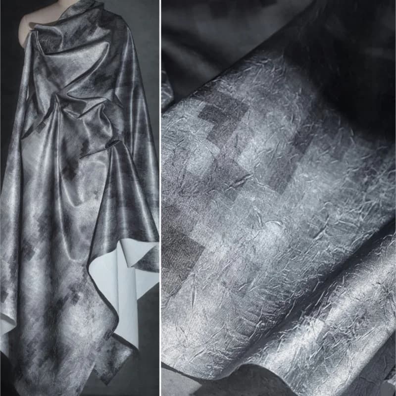 designer di abiti a mezza gonna a pieghe in tessuto con fantasia sfumata