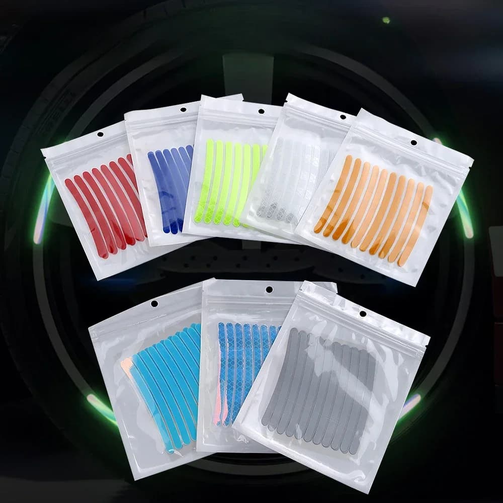 Adesivo riflettente che si illumina al buio per ruota per auto da 20 pezzi Adesivo di avvertimento per pneumatici per bicicletta Adesivo decorativo che si illumina al buio per auto elettrica