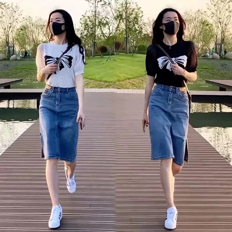 Completo da donna estivo 2026 stile Hong Kong: T-shirt con stampa a nodo e gonna in denim, due pezzi, snellente, versatile e alla moda