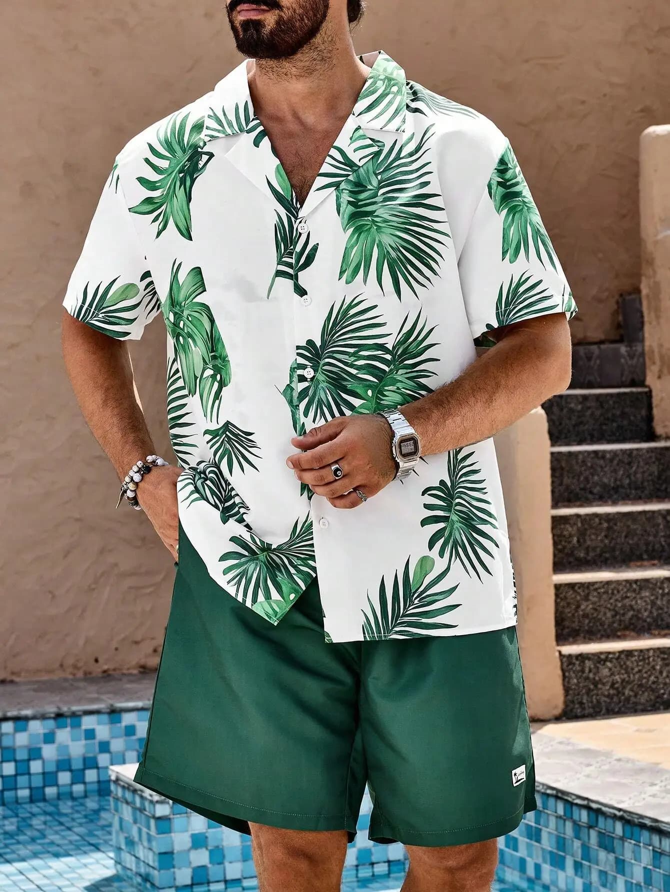 Set di camicia e pantaloncini hawaiani da uomo con stampa di foglie tropicali, outfit da spiaggia