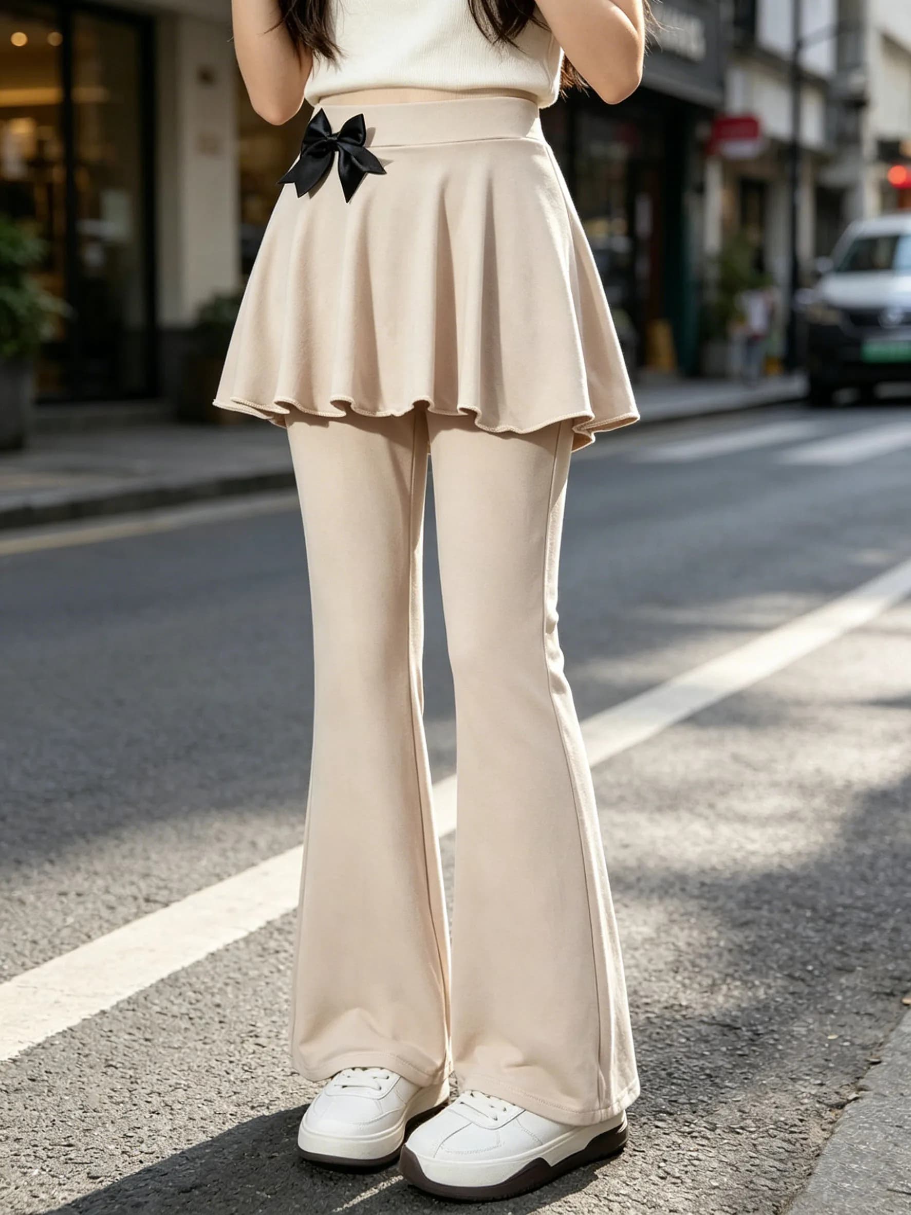 Pantaloni a gamba larga alla moda per ragazze, per la primavera e l'autunno, pantaloni da yoga casual da esterno per ragazze, tinta unita con motivo a fiocco.