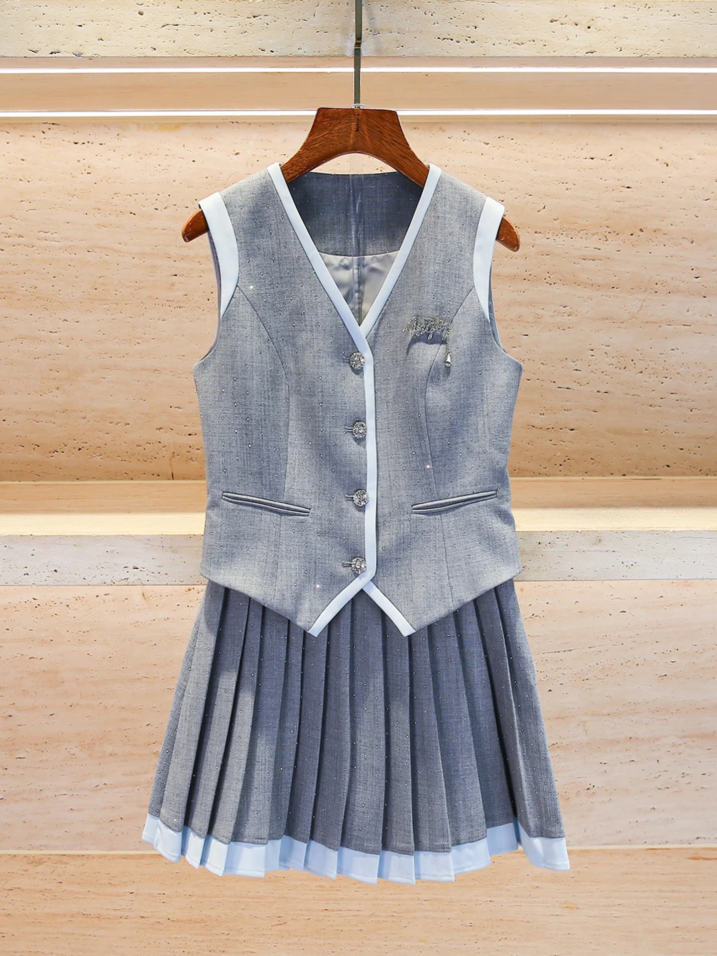 25 Gilet senza maniche da donna autunno con gonna a pieghe Set gilet di moda accademica