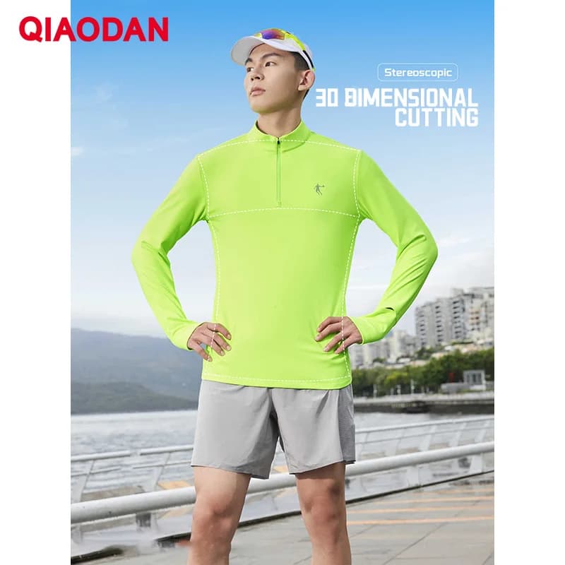 QIAODAN Feiying Magliette da Corsa Uomo Primavera 2026 Asciugatura Rapida Maniche Lunghe Traspiranti Abbigliamento Sportivo QXBTL3253109R