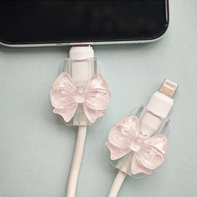 2 pezzi di protezione per cavo di ricarica in silicone con fiocco rosa adorabile, clip per supporto per cavo, copertura per cavo trasparente anti-rottura