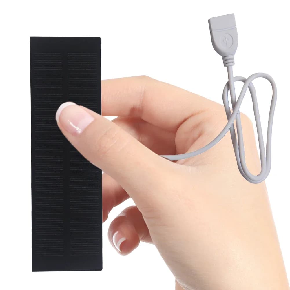 Caricatore da pannello solare USB Batteria portatile Banco di ricarica per telefono cellulare Pannello di ricarica per telefoni Ventole Torcia Piccole banche di alimentazione