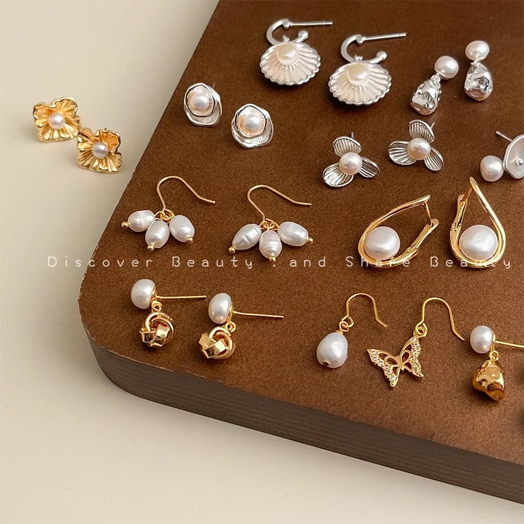DIY accessories Fashion commuter freshwater pearl stud earrings French light luxury butterfly fringed earrings niche high-end te