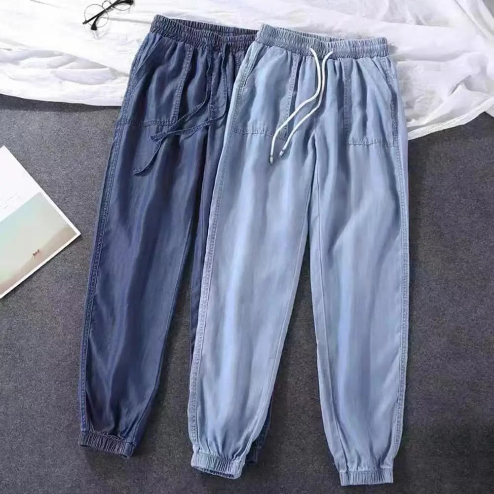 Jeans estivi sottili in seta di ghiaccio Pantaloni Harem elastici a vita alta con coulisse Pantaloni larghi in denim a nove punti con fascio tutto abbinato