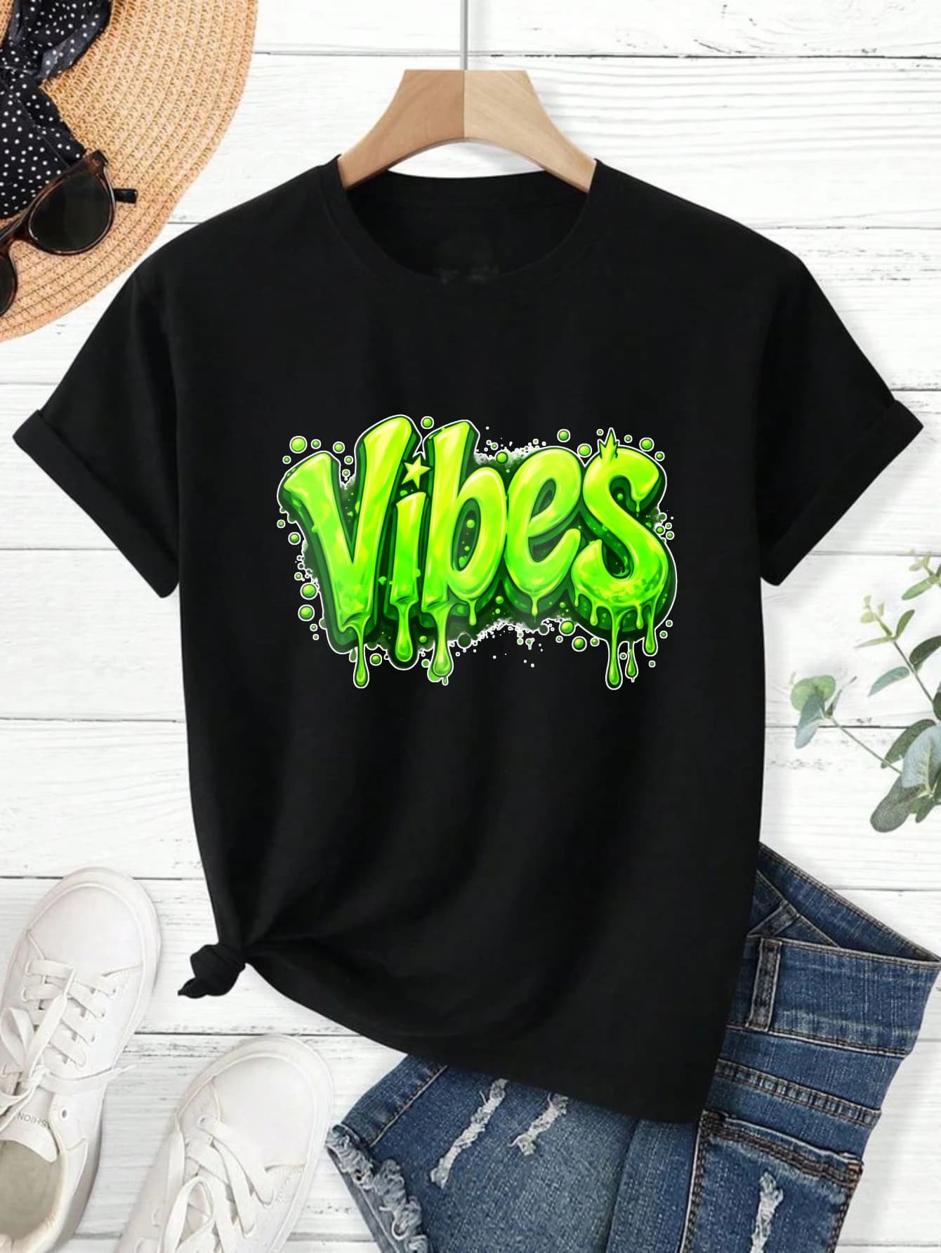 100% pure cotton short sleeved T-shirt Vibes Green Graffiti Style Text With Dripping Effect And Sparkle Accents On Black Background Easy to wear and match, comfortable and fashionable, suitable for all seasons, suitable for daily leisure, sports and