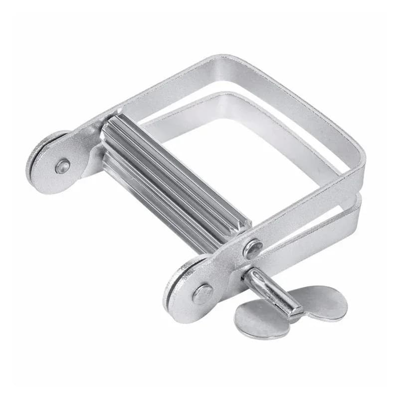 New mini spremi-tubo kit in aluminium with key roller for hair dyeing, hands cream, toothpaste