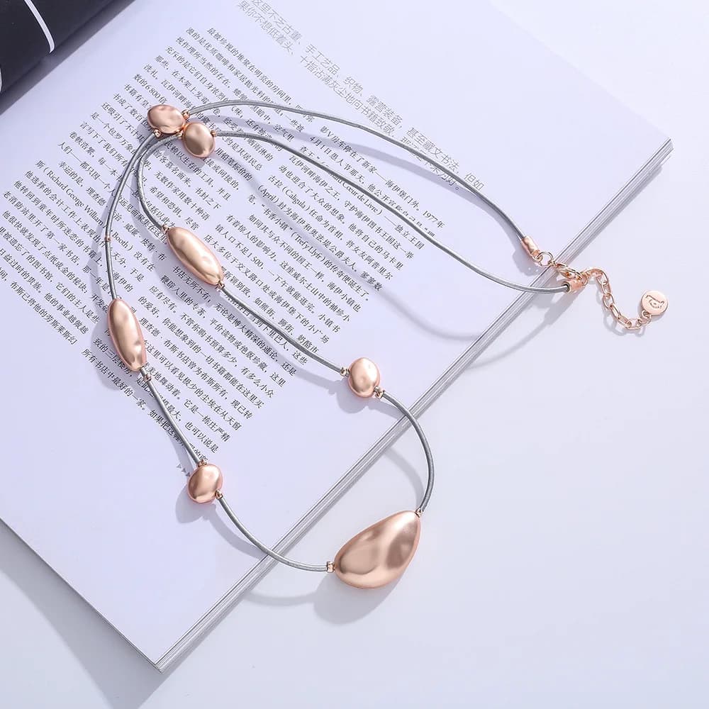 New fashion best-selling leather rope long European and American versatile elegant ladies metal necklace sweater chain