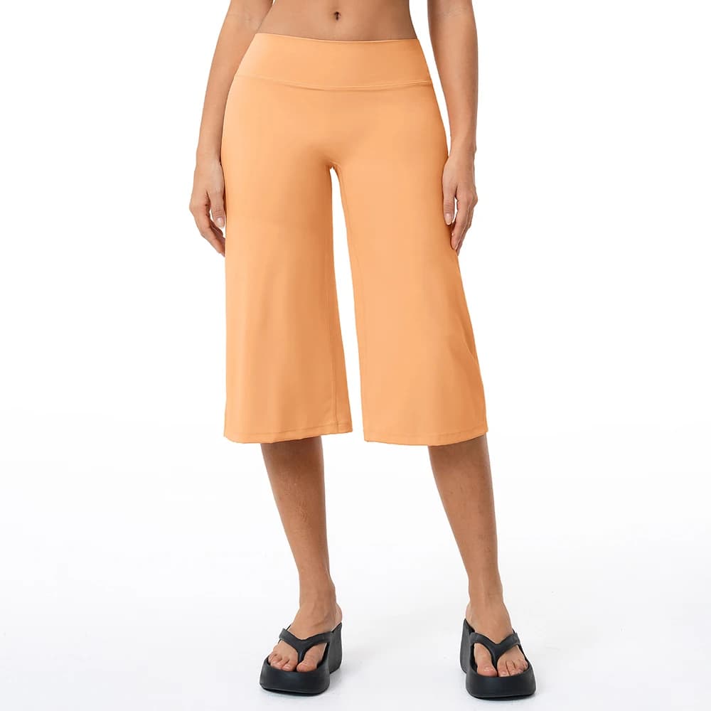Pantaloncini sportivi da donna a vita alta, larghi, traspiranti, ad asciugatura rapida, per yoga, fitness, ciclismo e corsa.