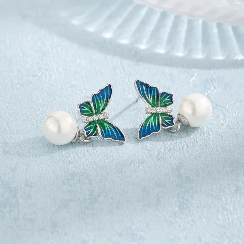 Retro francese S925 ago d'argento nuovi orecchini di perle di farfalla blu-verde orecchini di tendenza di lusso leggeri di moda super fata