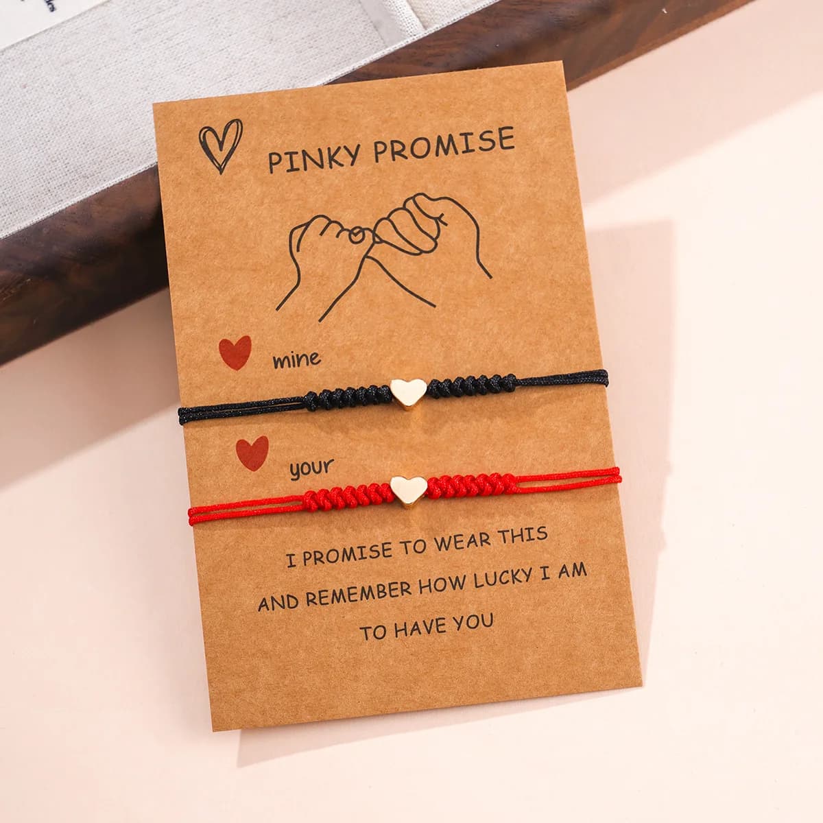 High-end niche design red string bracelet with black woven heart pendant, edgy sweet unique style, student-friendly bestie matching ring-style piece, anniversary gift, limited edition versatile accessory