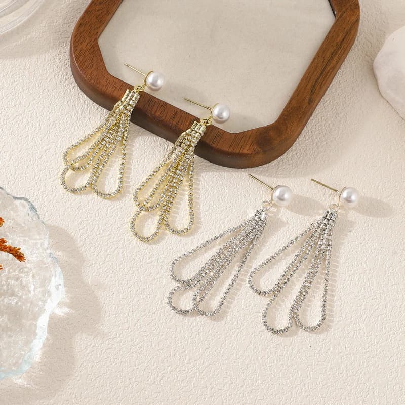 Lussuosi orecchini pendenti con nappe in zirconi intarsiati scintillanti, regali di gioielli per feste squisiti e alla moda da donna