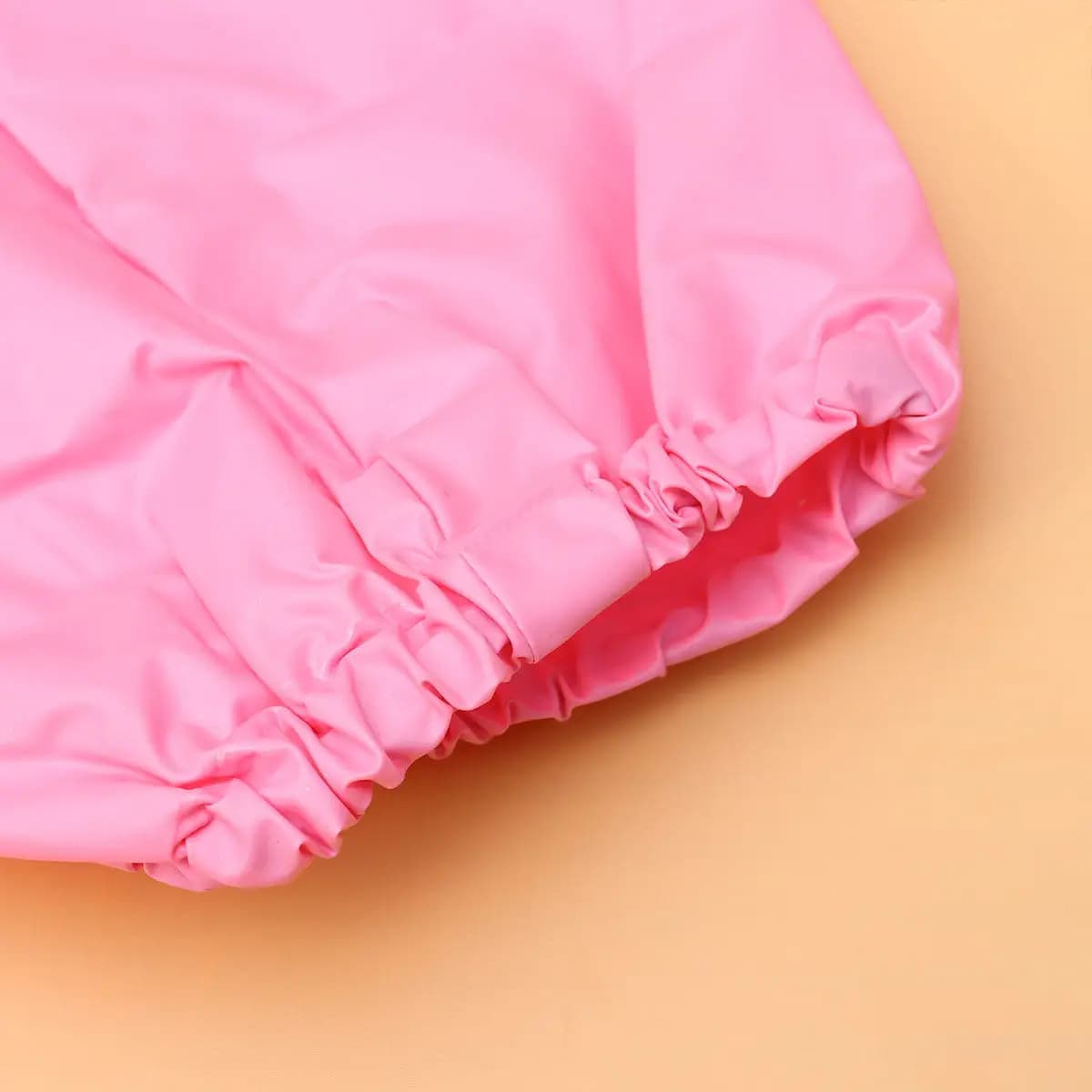 1 pair of waterproof rubber covers with pink elastic band for outdoor use for children, leg protectors, light, dust resistant and rain