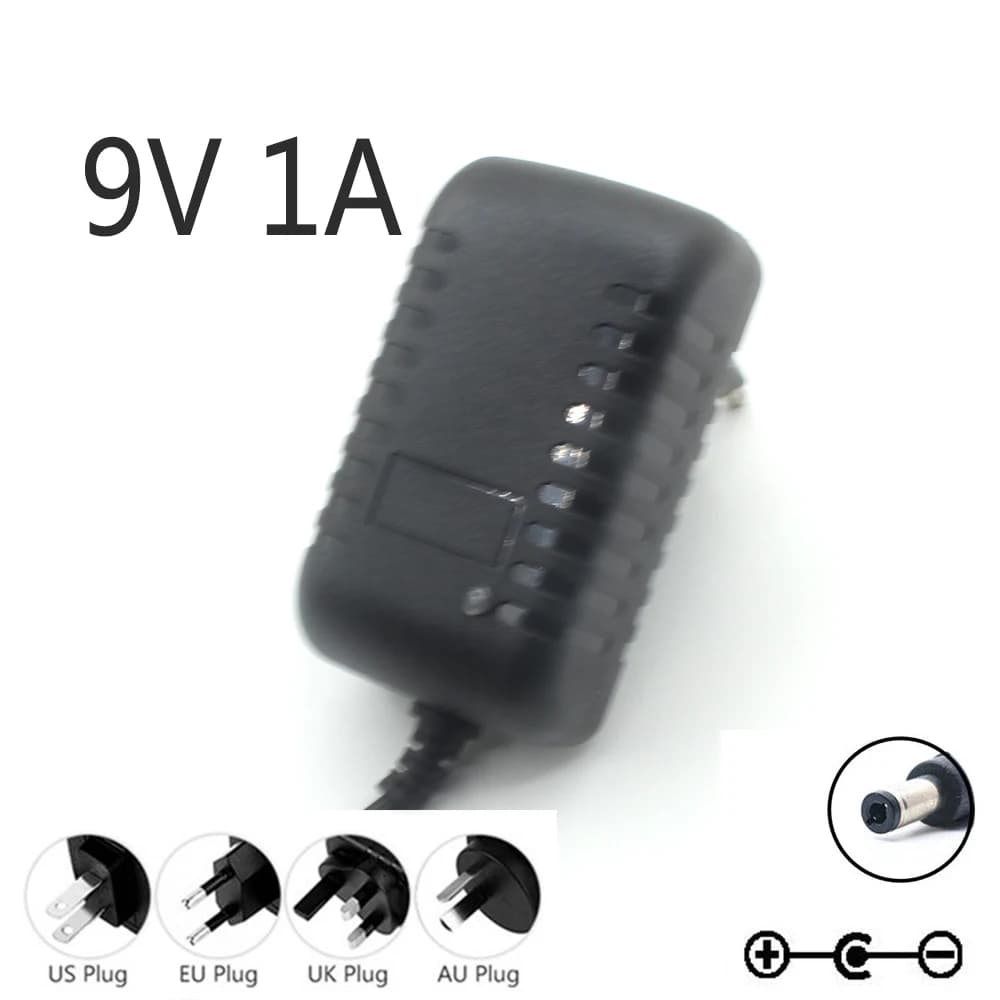 Alimentatore switching AC/DC 9V 1A per pedaliera effetti chitarra, adattatore con polarità inversa, negativo interno, spina EU US AU UK
